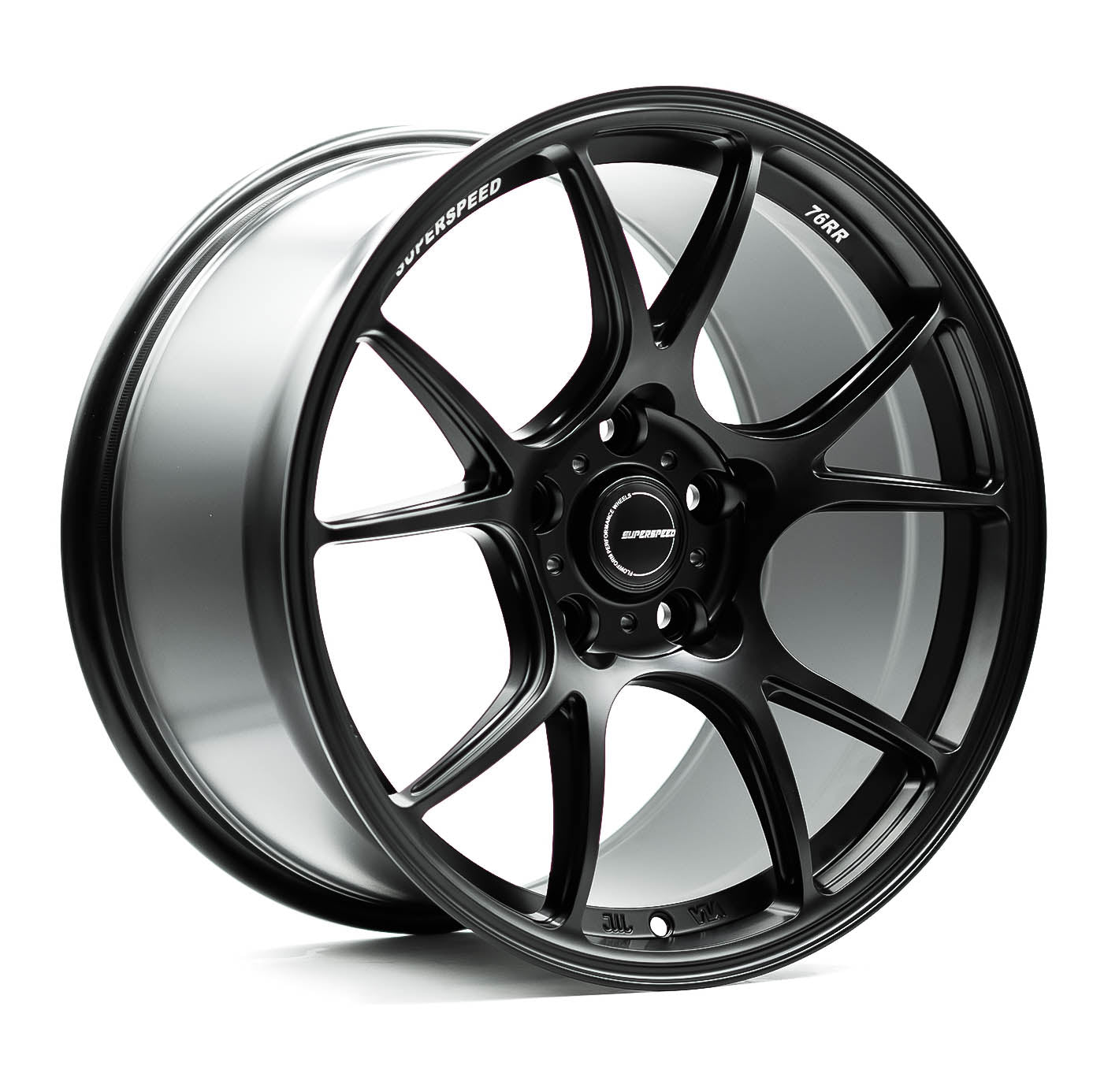 Black alloy wheel with visible branding on a white background