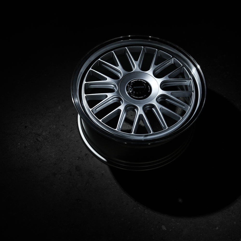 Car wheel rim on a black background